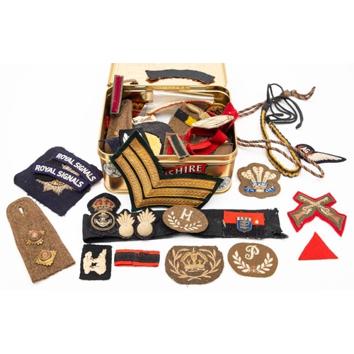 386 - A quantity of cloth insignia WWII and later.: