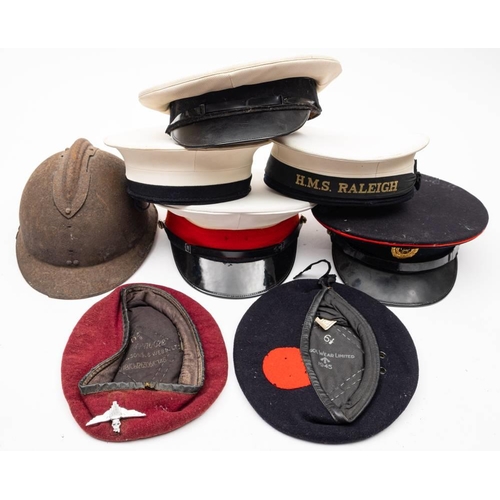 408 - A collection of various caps and head dress: to include a blue Royal Marines beret dated '1945' and ... 