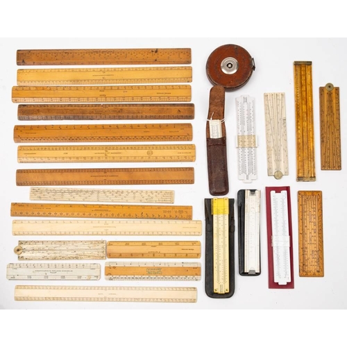 510 - A collection of various boxwood and celluloid rules and slide rules: including  a small slide rule b... 