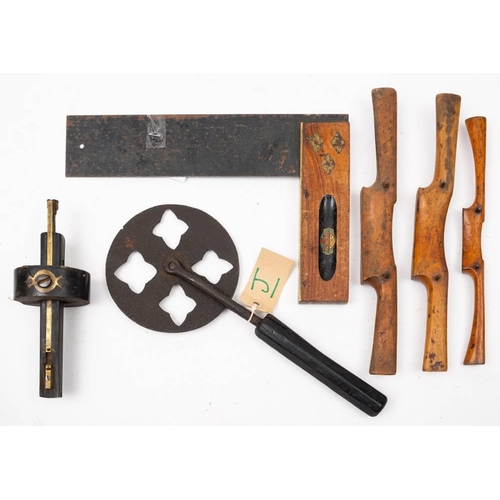 511 - A 19th century iron waywiser,: together with a brass mounted mortice gauge, a Smallwood square with ... 