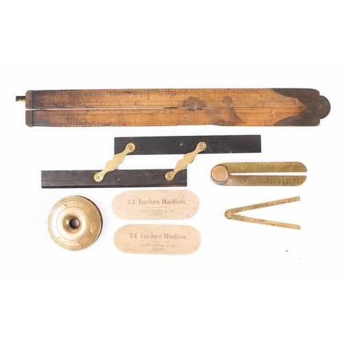 516 - A 19th century miniature brass folding rule: unsigned, together with one other brass folding gauge, ... 