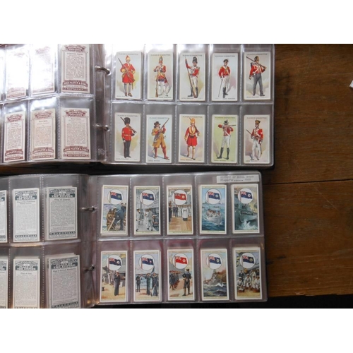 743 - Wills, Players and others, assorted sets of cigarette cards:- sets include Ships Badges, Flags of Th... 