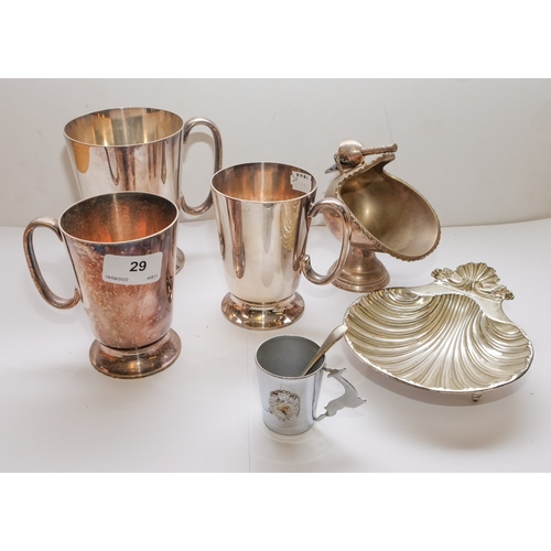 29 - Four assorted silver plated mugs, a twin branch candelabra, butter dish: etc.