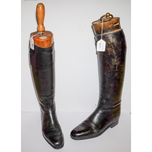 44 - A pair of Tom Hill black leather riding boots with trees: and one other pair of black leather riding... 