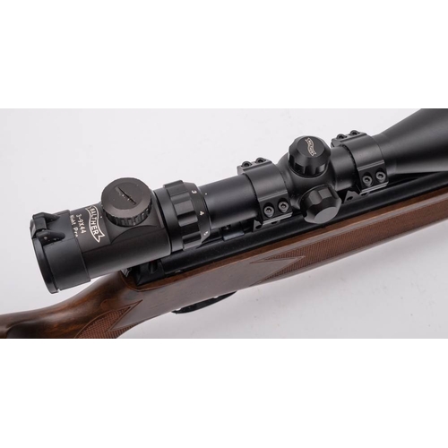 121 - A Hatsan Model 60 S .22 calibre air rifle: serial number '080807505', on a chequered semi pistol sto... 