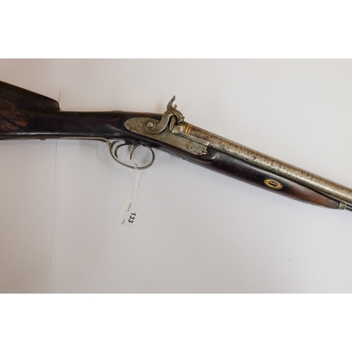 133 - A 19th century side by side  percussion cap shotgun: the plain 29 1/2 inch barrel with god inlaid ba... 