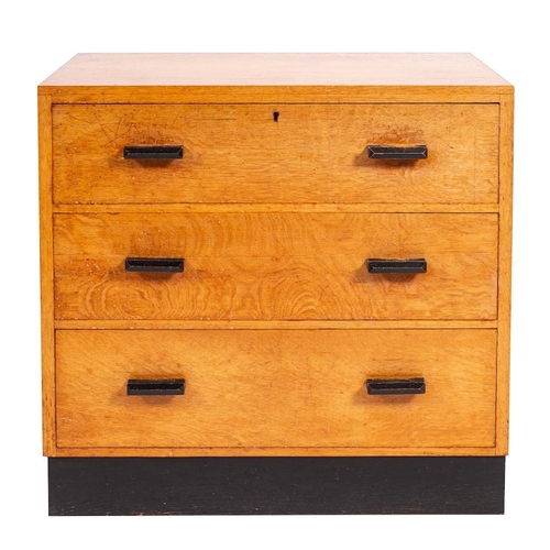 397 - Raleigh Furniture, an oak straight front chest, mid 20th century,: of three long drawers with ebonis... 