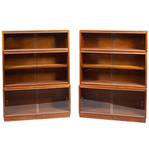 400 - A pair of Simplex mahogany and glazed three section library bookcases: maker's label as per title to... 