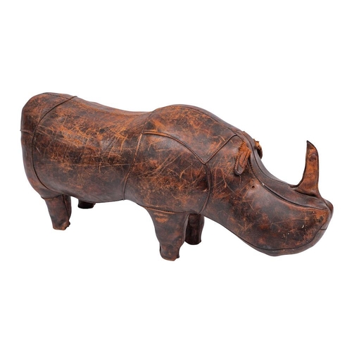 402 - A brown leather covered stool in the form of a rhinoceros, in the manner of Liberty & Co., second ha... 