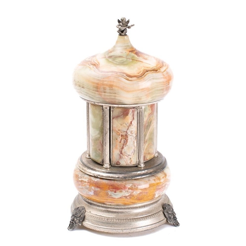 425 - A continental onyx and plated novelty musical cigarette dispenser: in the form of a temple, with dom... 