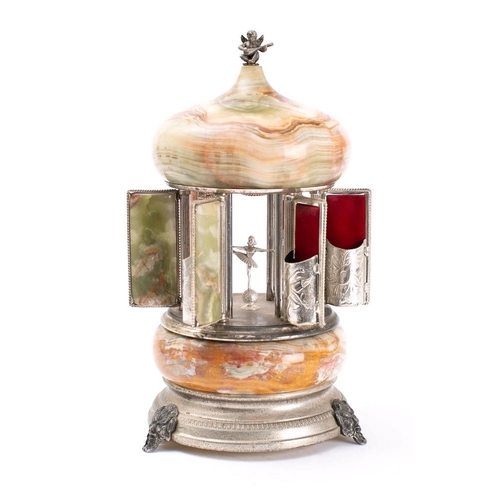 425 - A continental onyx and plated novelty musical cigarette dispenser: in the form of a temple, with dom... 