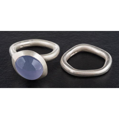 54 - Emily Thatcher Contemporary Jewellery, two modernist silver rings:, one set with a cabochon-cut blue... 