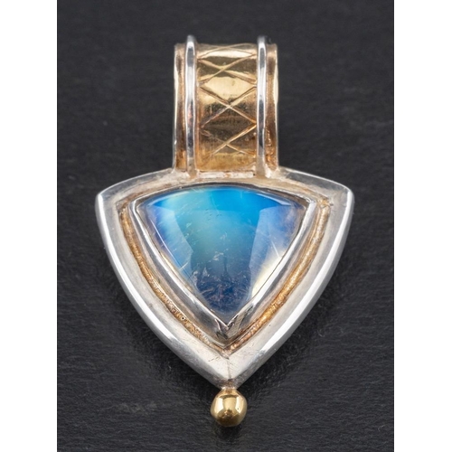 57 - Charmian Harris, a moonstone pendant,: estimated weight of moonstone ca. 7.5cts, length ca. 3.3cm, t... 