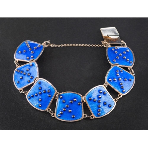 63 - K A Rasmussen, Oslo, Norway, a silver and blue enamel bracelet,: plaques with applied beaded abstrac... 