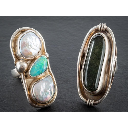 69 - Andrzej Pacak: two rings,: set with multi-coloured gemstones including quartz with tourmaline inclus... 