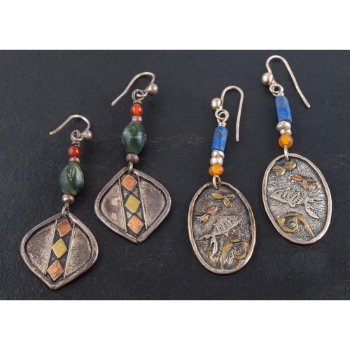 74 - Charmian Harris, two pairs of drop earrings,: one with lapis lazuli beads, the other with green chal... 