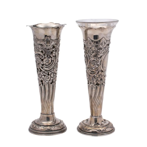 23 - A pair of Edward VII silver vases, maker S Glass, Birmingham, 1903: of trumpet-shaped outline, with ... 