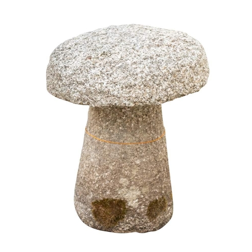 2351 - A granite staddle stone and cap, 18th / 19th century; the circular cap atop a rough hewn conical ste... 