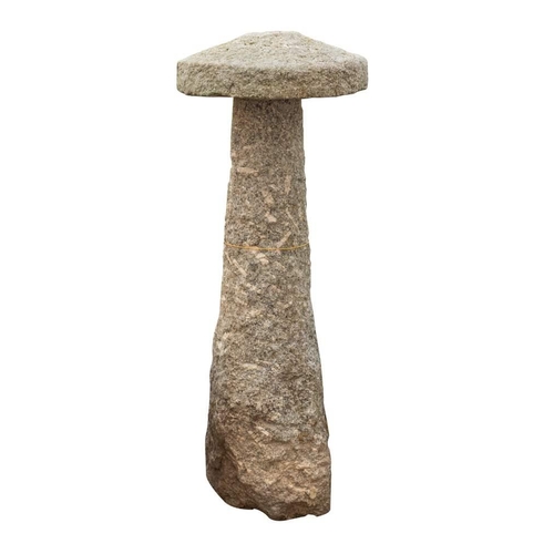 2353 - A large granite staddle stone and cap, 18th / 19th century; the circular cap atop a rough hewn conic... 