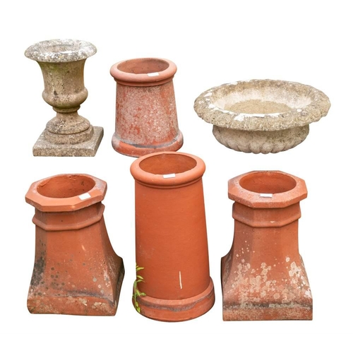 2356 - Four Victorian terracotta chimney pots, late 19th century,: comprising a pair of octagonal section, ... 