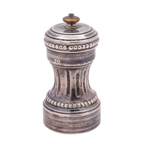 30 - A French silver pepper mill, stamped marks:, of waisted outline with fluted decoration, the steel gr... 