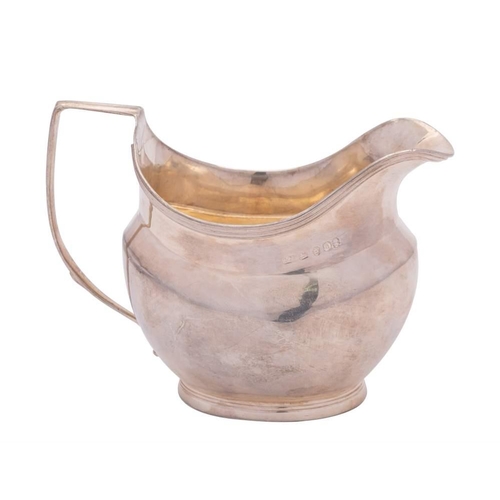 31 - A George III silver cream jug, maker I.M possibly John Merry, London, 1809: of barge-shaped outline,... 