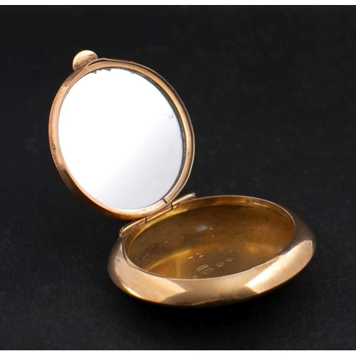 432 - A 9ct gold circular compact,: with a mirror to inside of lid, hallmarks for Birmingham, diameter ca.... 