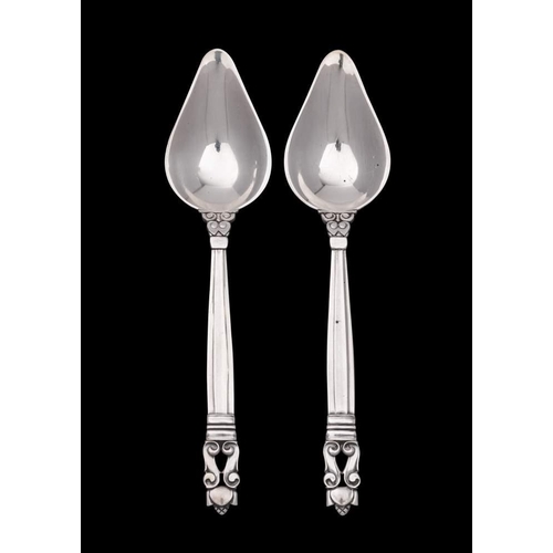 45 - A pair of Georg Jensen Acorn pattern grapefruit spoons, stamped marks: also bears import marks, 56gm... 