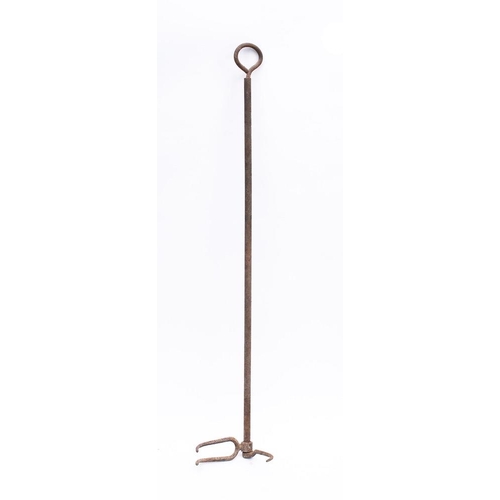 107 - An adjustable iron flesh fork: with key end adjustable tine, 124cm long.