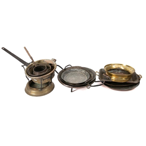 115 - Eight various copper, brass and tinned shallow pans:, a brass saucepan with iron handle, a copper sa... 
