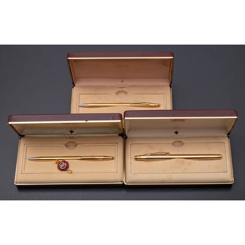 1341 - A Cross 2805 gold plated roller ball pen and two 2802 gold plated ball pens, cased (3)