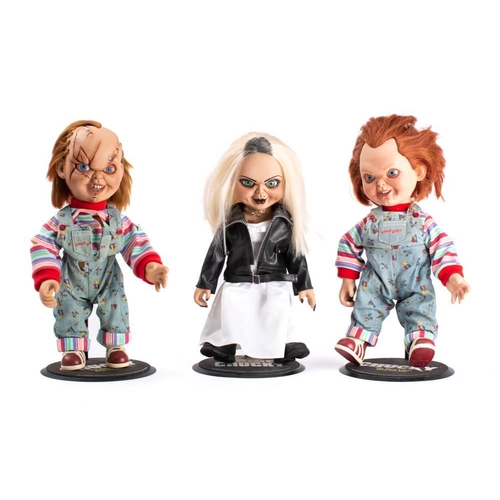 1349 - Two unboxed Chucky dolls and a Tiffany doll on stands: (3)