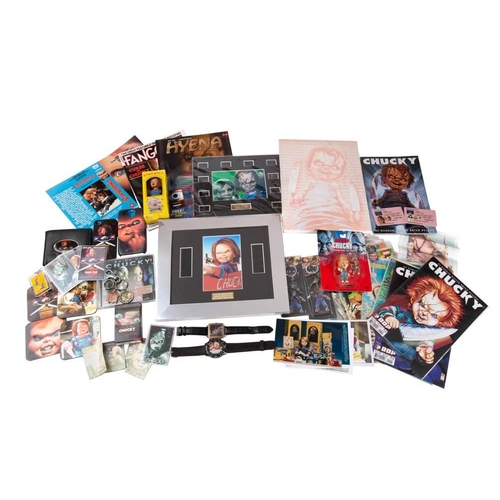 1352 - A collection of 'Child's Play' film  franchise merchandise, including two framed sets of presentatio... 