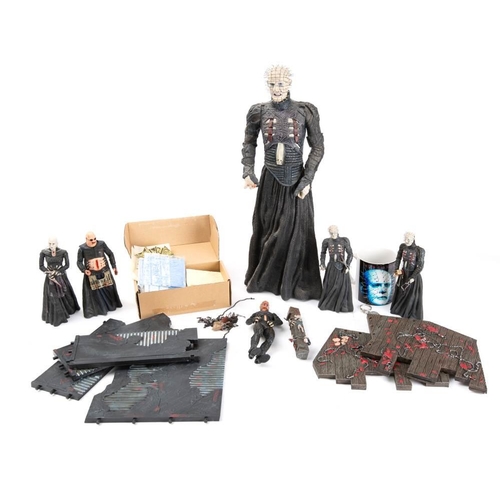 1355 - Reel Toys and others. A  boxed group of 'Hellraiser' figures in original blaster packs: together wit... 