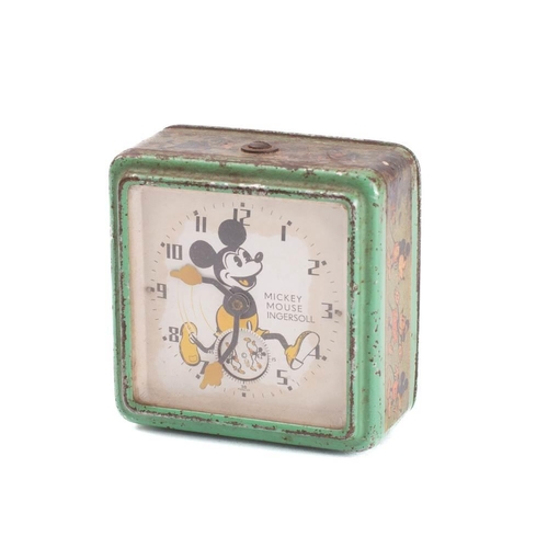 1357 - An Ingersoll Mickey Mouse alarm clock, circa 1930s:   green square tin case with transfer border, 10... 