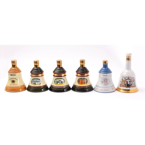 1385 - Six Bottles of Bells Whisky comprising;- a Royal Commemorative bottles, three Christmas bottles and ... 