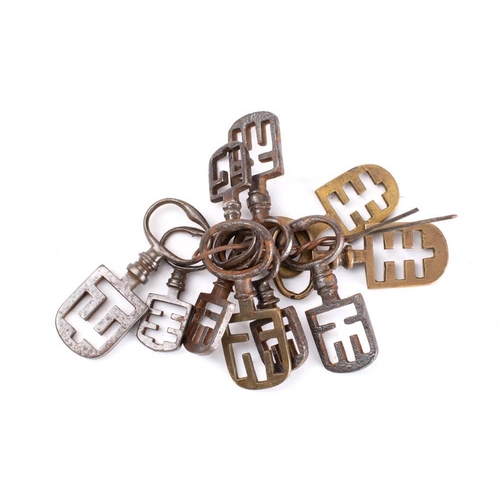 151 - A collection of ten French night latch keys: comprising brass and steel examples. (10)