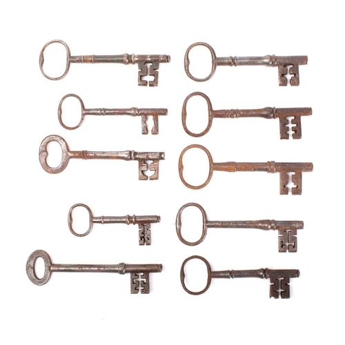 152 - Ten various steel keys with plain bows and shaped shanks: (10)