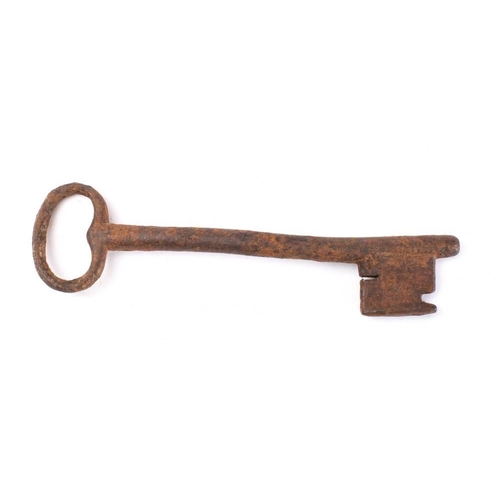 155 - An early steel key  with plain shank and bow, 16cm long