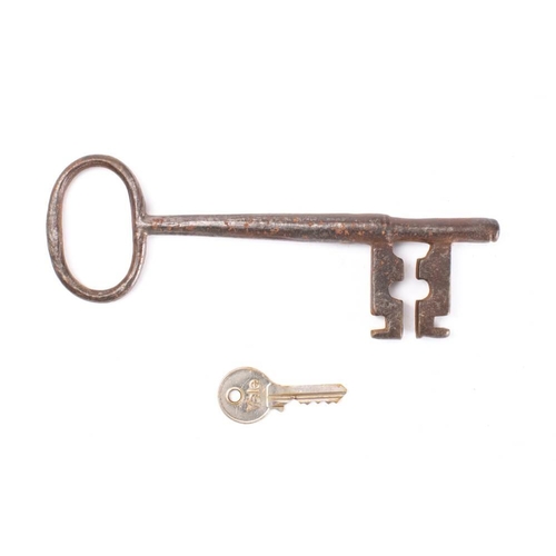 161 - An 18th century steel key , 19cm long: