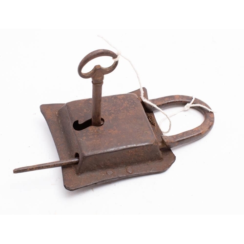 217 - A French wrought iron padlock and key, possibly 18th century: the  arched hasp with  elongated shaft... 