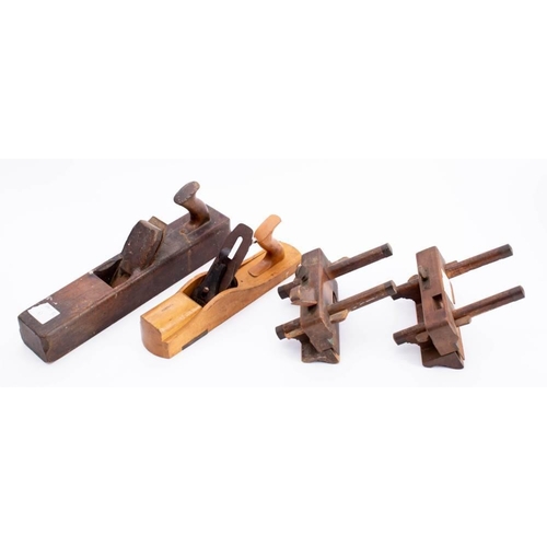 279 - A beech plough plane by Stother, F., together with one other plough plane, an unsigned jack plane an... 