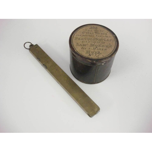 407 - A 19th century brass two section cap dispenser, together with an empty cap tin for 'Samuel Mozzen, G... 