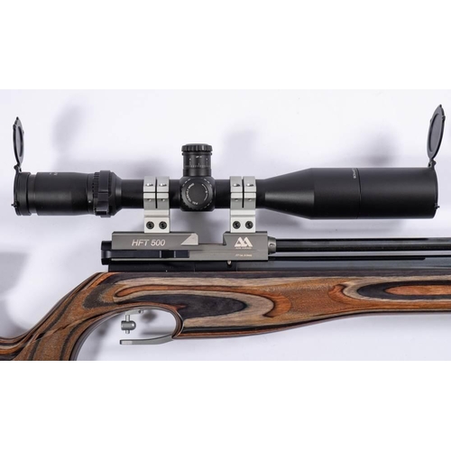 464 - An Air Arms HFT 500 .177 PCP air rifle; serial number 145171,  moderator, laminate stock with adjust... 