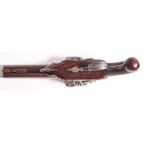 503 - A late 18th century side by side double barrel flintlock pistol by Gill, Richmond: the 9 inch Damasc... 