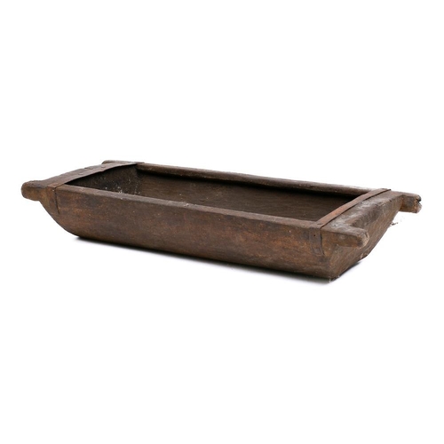 67 - A rectangular adzed wood salting trough: with central draining hole, 87 x 37.5cm.