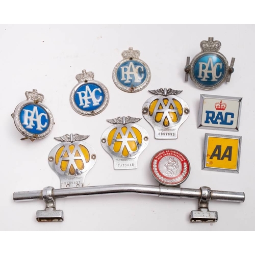 671 - A group of five various RAC badges, four AA badges and a nickel plated badge bar: