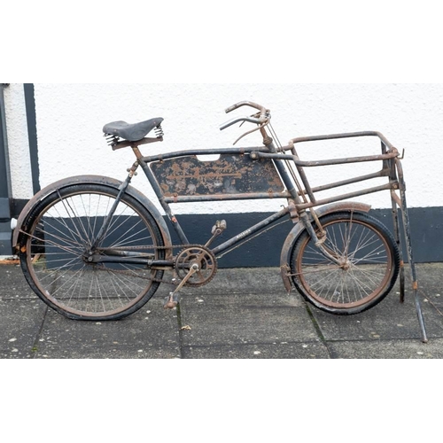 680 - A Raleigh 'All Steel' delivery bicycle:  with deep pannier frame  to front with fold down bi-pod sta... 