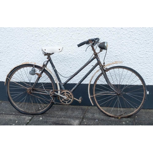 682 - A Hercules Cycle & Motor Co, Ltd ladies bicycle: with black step through frame and cable brakes.