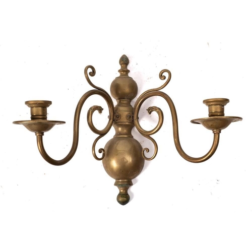 80A - A brass half-round wall mounted twin-branch light bracket: in the early 18th Century Dutch taste, ha... 